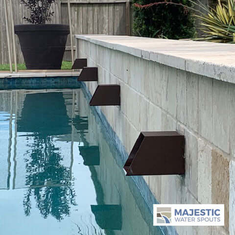 Majestic Water Spouts Box Scuppers on Pool Retaining Wall