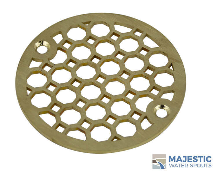 https://majesticwaterspouts.com/cdn/shop/products/Designer_Brushed_Brass_Shower_Drain_Cover_34_Front_Jacquet_Small_logo.jpg?v=1643293852