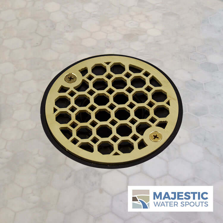 Brassh Jacque 4 " Round Decorative shower drain cover installed in shower