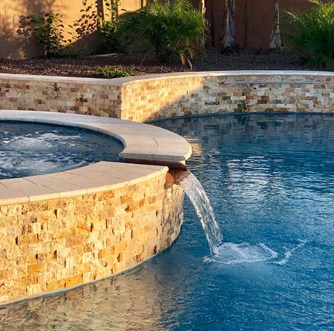 Copper spillway installed in spa to pool spillway